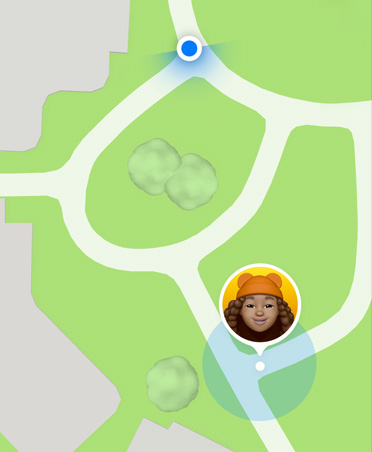 Maps interface with a blue dot indicating the parent or guardian's location along with a child's Memoji, indicating the child's location.
